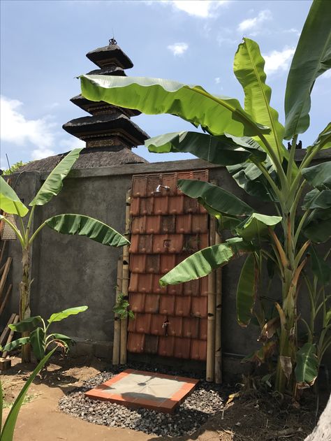 Outdoor shower from leftover roof tiles and bamboo Clay Roof Tiles Repurposed, Clay Roof Tiles Ideas Garden, Roof Tiles Ideas Garden, Tiles Garden, Gabion Cages, Compost Toilet, Garden Mulch, Terracotta Roof Tiles, Small Herb Gardens