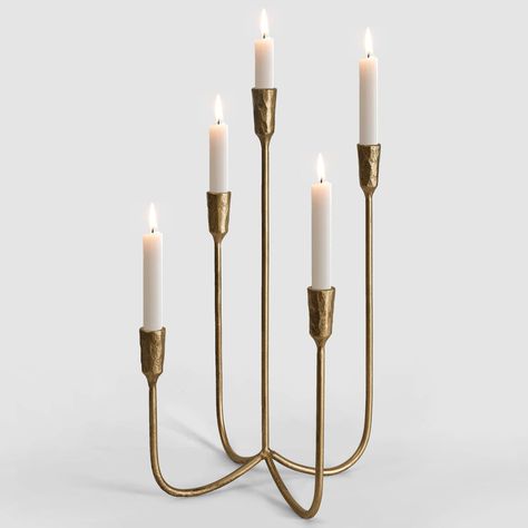 PRICES MAY VARY. Elegant Hand-Forged Design: This stylish metal candelabra features a hand-forged design with an antique brass finish, adding a touch of sophistication to any space. Unique Antique Brass Finish: Constructed of metal with an antique brass finish and an imperfect texture, this candelabra boasts a unique appearance that stands out. Versatile Home Decor Piece: This handsomely eclectic candelabra is a gorgeous addition to your living room, dining room, or bedroom, enhancing the ambian Fireplace Candles, Tall Candle Holder, Gold Candlestick Holders, Candle Holder Wedding, Candle Candelabra, Metal Candelabra, Tall Candle Holders, Candle Holders Wedding, Tall Candle