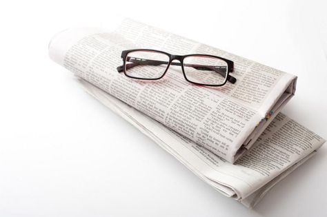 Download image of Reading glasses on a folded newspaper Newspaper Product Photography, Newspaper Reading Photography, People Reading Newspaper, Reading Newspaper Illustration, Woman Reading Newspaper, Folded Newspaper, Download Image, Green Frame, Edgy Wallpaper