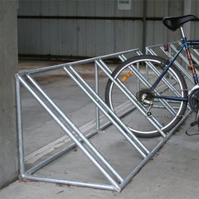 Bike Racks & Rails  Do you enjoy cycling and want to ensure the security of your bike? Kings Bicycle Parking has a wide range of finest quality made bike racks and rails to enhance the safety of your bike in the parking area. For more details, give us a call today at 1800 272 849. Bicycle Parking Design, Rack Velo, Diy Bike Rack, Cycle Stand, Bike Storage Garage, Bicycle Stand, Diy Motorcycle, Parking Area, Bicycle Storage