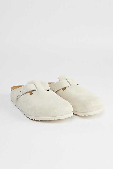 Classic Birkenstock Boston clogs with a soft footbed. Essential suede clogs with buckle closures at the sides. Features a molded footbed for comfortable wear and a textured EVA outsole. Features Birkenstock Boston soft footbed clog Slip on suede clogs Buckle side closure Molded footbed Textured outsole Content + Care Suede, leather, rubber Spot clean Imported Size + Fit Birkenstock regular width Fits like a medium D width | Birkenstock Boston Soft Footbed Clog in White, Men's at Urban Outfitters Birkenstock Clogs Colors, White Birkenstock Clogs Outfit, Cute Birkenstocks, Birkin Stocks, Birkenstocks Clogs, Birkenstock Boston Soft Footbed, Birkenstock Boston Clogs, Boston Soft Footbed, White Birkenstocks