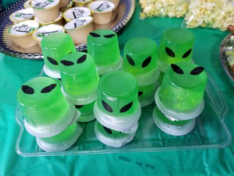 Alien Birthday party Cowgirls And Aliens Party, Alien Party Favors, Alien Party Snacks, Alien Gender Reveal, Alien Birthday Decorations, Space Themed 21st Birthday Party, Space Alien Birthday Party, Aliens Birthday Party, Alien Jello Shots