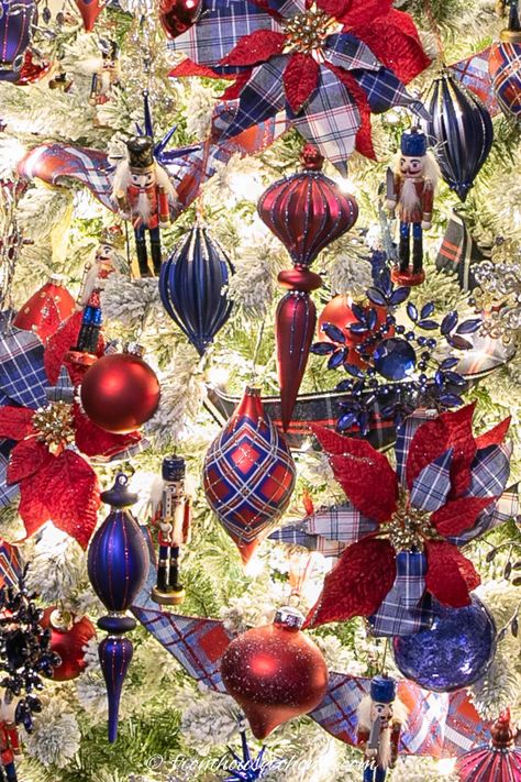 For some holiday decorating inspiration, these red and blue nutcracker Christmas tree ideas are a traditional Christmas theme that represents good luck and good will. Perfect for the holiday season! Tartan Christmas Decorations, Blue Nutcracker, Nutcracker Christmas Tree, Glam Christmas Decor, Flocked Christmas Trees Decorated, Blue Christmas Decor, Red Christmas Decor, Royal Christmas, Glam Christmas