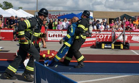 This is part of the Firefighter Combat Challenge, called the toughest 2 minutes in sports by ESPN. The course simulates real-life events that firefighters encounter. Here he has to drag a 180lb dummy, all while wearing 100bls of bunker gear. Firefighter Combat Challenge, Bunker Gear, Firefighter Pictures, Fire Fighters, Fire Fighter, Paramedic, Firefighter, Motorcycle Jacket, Real Life