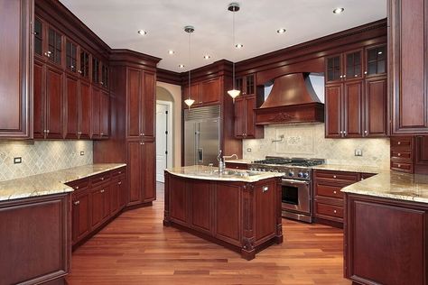 Here we have another great example of cherry wood contrasting with a more natural tone on the floor. Mahogany Kitchen Cabinets, Mahogany Kitchen, Cherry Wood Kitchen Cabinets, Cherry Wood Kitchens, Dark Wood Kitchen Cabinets, Kitchen Cabinets Pictures, Solid Wood Kitchen Cabinets, Dark Wood Kitchens, Wood Floor Kitchen