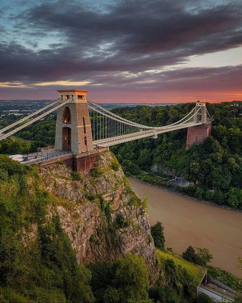 The Clifton Suspension Bridge is a suspension bridge spanning the Avon Gorge and the River Avon, linking Clifton in Bristol to Leigh Woods… Clifton Bridge, Amazing Bridges, Isambard Kingdom Brunel, City Of Bristol, Famous Bridges, Bristol England, Bristol City, East Anglia, Bristol Uk