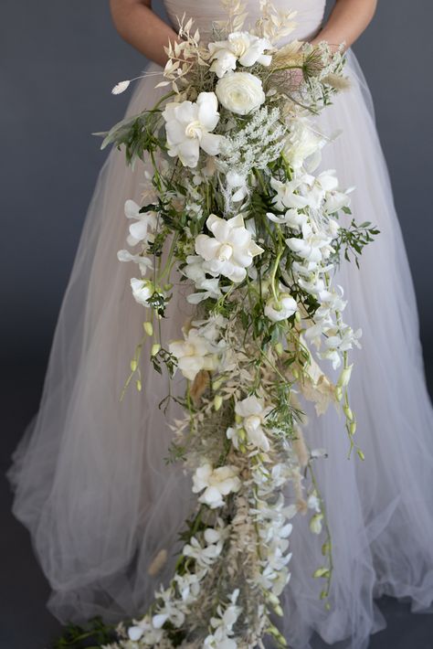 Petite Cascading Bouquet, Fae Wedding Bouquet, Cascading Wedding Bouquets Greenery, Overflowing Bridal Bouquet, Long Bride Bouquet, Orchid Floral Arrangements Wedding Ideas, Cascade Wedding Bouquet White, Waterfall Bouquet Wedding Blue, Cascading Dried Flower Bouquet