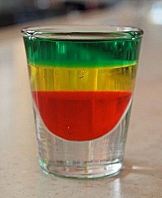 A delicious recipe for Bob Marley, with Midori melon liqueur, Jagermeister herbal liqueur and Goldschlager cinnamon schnapps. Bob Marley Drink, Jamaican Party, Jello Shot, Schnapps, Adult Drinks, Party Drinks, Destiel, Non Alcoholic Drinks, Non Alcoholic