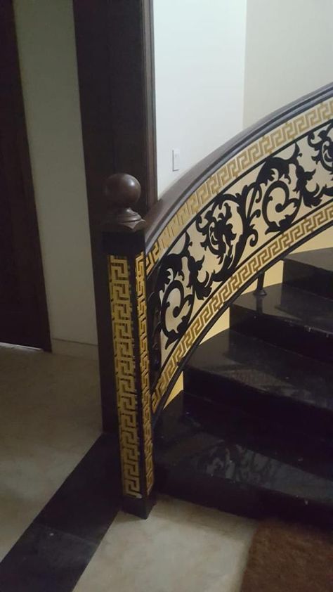 Modern stair railing- black and gold. Black And Gold Staircase, Golden Staircase Railing, Ss Railing Design For Staircase, Wooden Grill Design For Stairs, Ms Grill Design For Staircase, Cnc Stair Railing Design Modern, Toilet Tiles Design, Black Stair Railing, Round Stairs