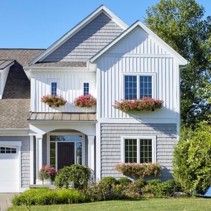 Even if you don’t have this Michigan cottage’s view, its details can bring relaxed vacation style to your home. Lake Cottage Exterior, Lily Pad Cottage, Farmhouse Exteriors, Faux Headboard, Old School Desks, Michigan Cottage, Lake Theme, Lake Houses Exterior, Boat Illustration