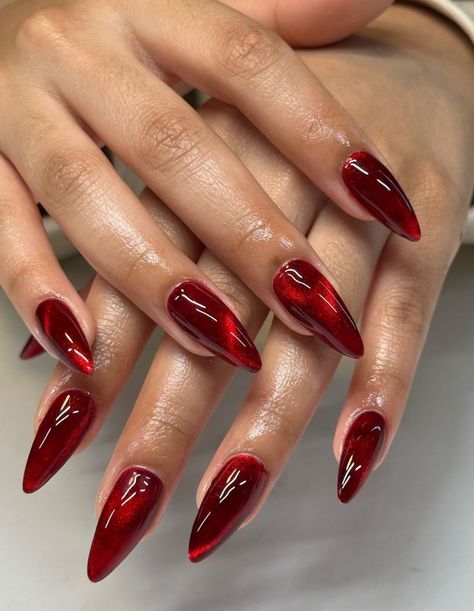 Moody Red Nails, Glassy Red Nails, Red Opal Nails, Dark Magnetic Nails, Red Aura Nails With Chrome, Holiday Nails Aesthetic, Glass Nails Red, Chappell Roan Inspired Nails, Pearl Red Nails