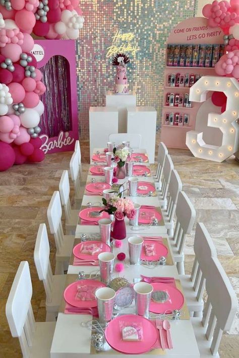 Check out this fun Barbie pool birthday party! The table settings are stunning! See more party ideas and share yours at CatchMyParty.com Barbie Party Table Setting, Kids Table For Birthday Party, Barbie Food Table, 2nd Birthday Barbie Theme, Barbie Set Up, Barbie 1st Birthday Party, Barbie Party Table Set Up, Barbie Tea Party Birthday, Kids Birthday Party Table Set Up