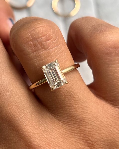 Our Aviva Solitaire Engagement Ring customized with an emerald cut diamond 💎 • • #finejewelry #engagement #enagementring #solitaireengagementring #emearldcut #gold #ring #rings💍 #engagementringinspo Emerald Cut Gold Diamond Ring, Emerald Engagement Ring Cut Gold, Gold Emerald Cut Diamond Ring, Gold Band Emerald Cut Engagement Ring, Engagement Rings Emerald Cut Gold, Yellow Gold Emerald Cut Engagement Ring, Emerald Cut Gold Engagement Ring, Emerald Cut Ring Gold, Emerald Shape Engagement Ring