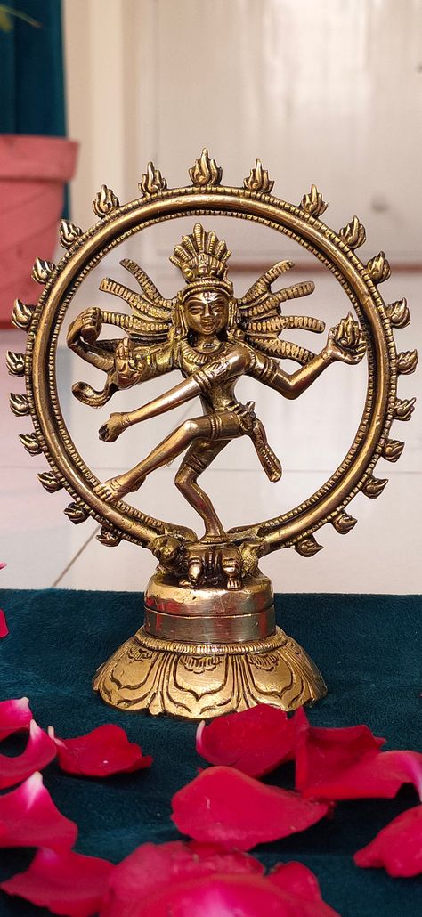 Material: Brass Dimension: 5.5Inches height, Weight 590 grams Lord Natraj Idol - God of Extreme Power in a Dance Form Called Tandav Natraj Idol dancing in the circle of fire.Beautiful statue for home decorative items in the living room. Washing instruction: Gentle Wash, Don't use any harsh chemicals. A POSITIVE IMPACT: As per VASTU & Hinduism belief Religious Spritual Idols Showpieces Placed in North East Direction of Drawing / Living & Pooja Room, brings Wealth, Health, Peace & Happ Lord Shiva Dancing, Hinduism Beliefs, Natraj Statue, Shiva Dancing, East Direction, Dancing Shiva, India Gift, Decorative Sculpture, Pooja Rooms