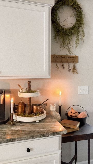 amanda lauren on Instagram: "Another look at day 5 of my 13 nights of Halloween 🎃 just love how this Practical Magic styling turned out ✨ 8 more themes to go!! Day 6 coming later 🖤 What are you hoping to see on my list? . . . Halloween, Halloween kitchen decor, kitchen Inspo Halloween tablescape, home decor, halloween  Inspo, spooky, falloween, fall Inspo, cozy cottage, candles, French country, cottage core, Traditional, home decor, fall aesthetic, antique, Inspo, Halloween, spooky vibes, home decor, Halloween decor fall cottage, creepy, Halloween Inspo #frenchcountrystyle #halloweendecor #halloweeninspo #13nightsofhalloween #day5 #halloweentablescape  #frenchcountrycoastal #90s #practicalmagic #witchyvibes #90switchaesthetic #ａｅｓｔｈｅｔｉｃ #witchykitchen #apothecary" Spooky Kitchen Aesthetic, Witch Cottage Halloween Decor, Practical Magic Kitchen Inspiration, Halloween Aesthetic Kitchen, Practical Magic Aesthetic Home Decor, Cottage Core Fall Decor, Spooky Aesthetic Decor, Gothic Cottagecore Aesthetic Kitchen, Cottage Candles