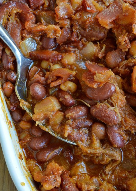 The pulled pork and bacon in this Double Pork Baked Beans Recipe makes it perfect as a side dish or dinner! Homemade pork and beans is super easy and delicious. This dish is great for feeding a hungry crowd! Pulled Pork Side Dishes, Pork And Beans Recipe, Pork Side Dishes, Cowboy Baked Beans, Ground Beef Breakfast, Pork And Beans, Best Baked Beans, Bbq Beans, Baked Beans Recipe