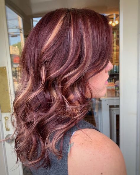 Vibrant red base color with high contrast highlights throughout. Absolutely stunning red hair. Created by Stylist Angi. Call 410-795-9465 to reserve today. #redhair #redhead #red #highlights #vibrantred #healthyhair #curlyhair #redvelvet #eossalon #redken #pulpriot Burgundy Hair With Highlights, Shades Of Brown Hair, Brown Hair With Caramel, Purple Blonde Hair, Burgandy Hair, Fall Szn, Red Hair With Blonde Highlights, Wine Hair Color, Red Hair With Highlights