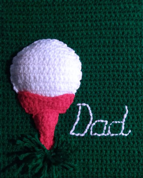 This 3D crochet art is perfect for any occasion and for family, friends, and as a housewarming gift. Perfect for a DAD or a guy who loves ties! More information on the link. Crochet Golf Ball, Crochet Drawstring Bag, 3d Crochet, Tee Ball, Green Backdrops, Lint Remover, Red Yarn, Red Tee, Fabric Glue