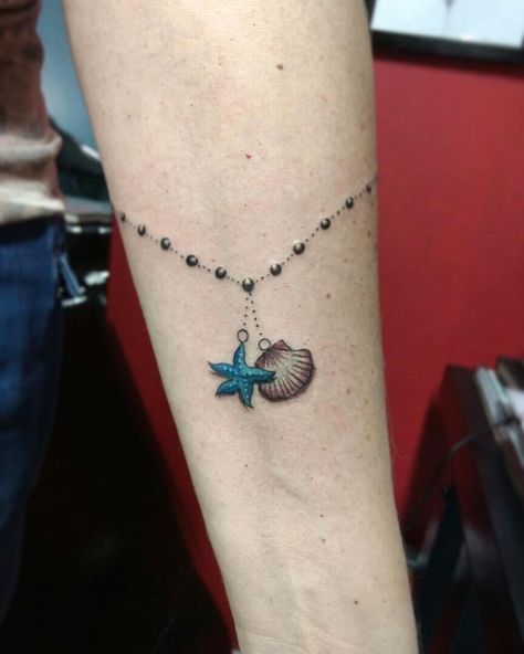 Seashell Bracelet Tattoo, Ocean Anklet Tattoo, Marine Life Tattoo Small, Ocean Bracelet Tattoo, Cruise Tattoos For Women, Starfish Tattoo Small, Ocean Tattoo Ideas, Hai Tattoo, Wrist Bracelet Tattoo