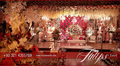 Red Crystal Theme Reception - Tulips Event Management Red Gold Wedding Theme, Red Gold Wedding Decorations, Barat Decor, Royal Wedding Decorations, Grand Wedding Reception, Outdoor Wedding Reception Decorations, Wedding Ceiling Decorations, White Wedding Centerpieces, Gold Wedding Centerpieces