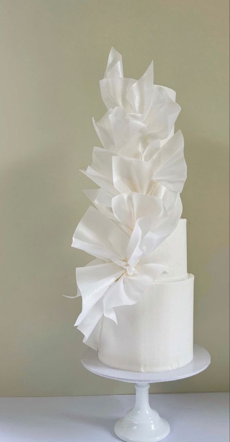 White four tier modernist wedding cake Wedding Cakes With Wafer Paper, Wedding Cake Wafer Paper, Wedding Cake Rice Paper, Structural Wedding Cake, Wafer Paper Wedding Cake, Contemporary Wedding Cake, Architectural Wedding, Luxury Wedding Cake Design, Fake Wedding Cakes