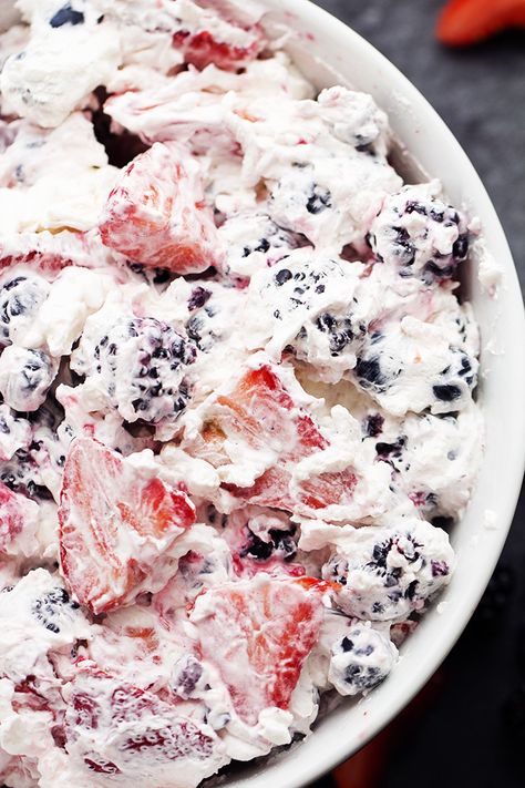 Fresh berries combine with a creamy cheesecake fluff.  This is so amazing and will be the hit of any gathering! I am loving the fresh and delicious berries that are starting to pop up in the stores right now.  I love fresh fruit!   We eat so much fruit around here it is crazy.  I am … Cream Cheese Fruit Salad, Berry Cheesecake Salad, Easy Bbq Side Dishes, Cheesecake Fluff, Cheesecake Salad, Berry Cheesecake, Side Dishes For Bbq, Ambrosia Salad, Whip Cream