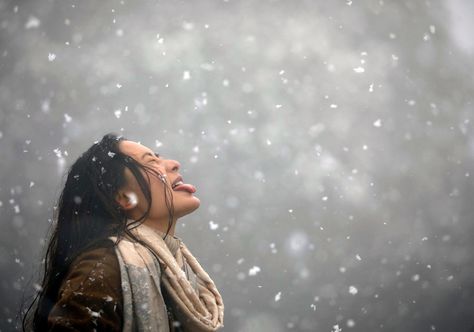 The Atlantic - A woman tries to catch snowflakes with her tongue during a snowfall on Chandragiri Hills in Kathmandu, Nepal, on January 23, 2019. Catching Snowflakes On Tongue, Chandragiri Hills, Catching Snowflakes, Giorgio Vasari, Unmarried Women, Couples Book, Kathmandu Nepal, Chalk Drawings, January 23