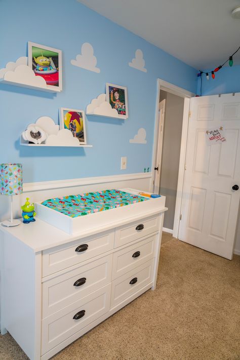 Andy’s Room Nursery, Cloud Shelves Nursery, Subtle Toy Story Nursery, Toy Story Dresser, Unique Baby Boy Nursery Themes, Toy Story Baby Room, Toy Story Room Ideas For Boys, Toy Story Nursery Ideas, Disney Boy Nursery