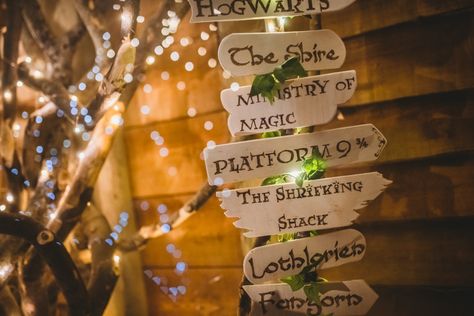 Harry Potter & Lord of the Rings Themed Wedding in a Treehouse · Rock n Roll Bride Lord If The Rings Wedding, Lord Of The Rings Seating Chart, Harry Potter Lord Of The Rings Wedding, Harry Potter And Lord Of The Rings Wedding, Lord Of The Rings Themed Wedding, Lord Of The Rings Wedding Theme, Stuffed Otter, Middle Earth Wedding, Lord Of The Rings Wedding