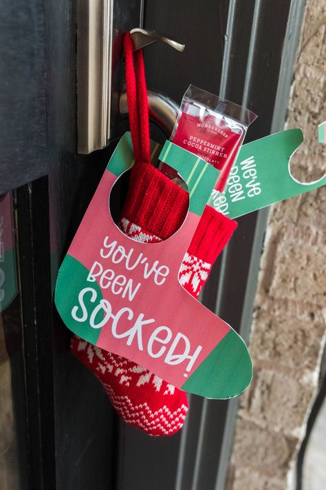 Secretly "sock" your neighbors and friends with the fun You've Been Socked Game. Learn how to play this gifting game filled with fun surprises. #YouveBeenSocked #GiftingGame #Christmasgames #Gift #DIYGame #Printable