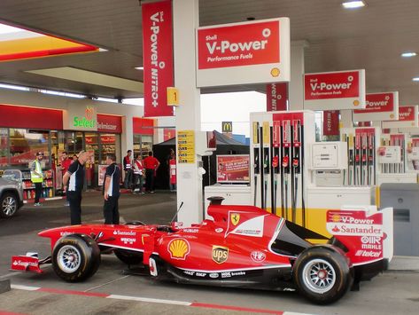 Shell V-Power: Just another day at a Shell station with Sebastian ... Shell Gas Station, Power Logo, Marketing Department, Logistics Management, Sports Marketing, Filling Station, Gas Stations, Sebastian Vettel, Shell Station