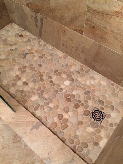 Tiled Shower Ideas Pebble Floor, River Stone Shower Floor Bathroom Ideas, River Rock Shower Floor With Subway Tile, Pebble Tile Shower Floor Rustic, Pebble Stone Shower Floor Lowe's, Bathroom Tile Design Ideas, Stone Patio Designs, Tile Design Ideas, Rustic Bathroom Designs