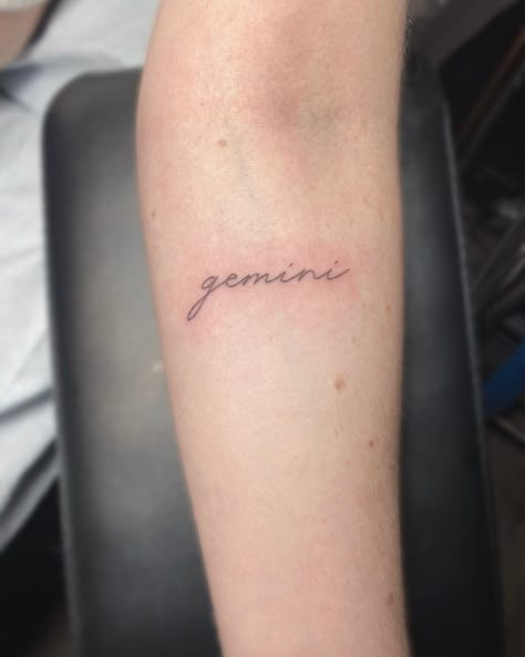 30+ Unique Gemini Tattoo Ideas for Women and Men in 2023 Gemini Writing Tattoo, Gemini Cursive Tattoo, Tattoo Ideas Gemini Unique, Red Gemini Tattoo, Gemini Tattoo Small Simple, Gemini Wrist Tattoo, Gemelli Tattoo, Cute Gemini Tattoo, Gemini Tattoo For Women Unique