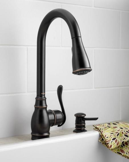 Eco-friendly kitchen faucet | SILive.com Bronze Kitchen Handles, Mirrored Kitchen Cabinet, Oil Rubbed Bronze Kitchen Faucet, Kitchen Sink Remodel, Oil Rubbed Bronze Kitchen, Bronze Kitchen Faucet, Rubbed Bronze Kitchen, Moen Kitchen Faucet, Kitchen Faucet With Sprayer