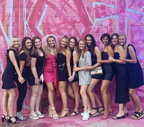 Bride in pink, bridesmaids in black Black And Pink Bachelorette Outfit, Bachelorette Party Outfits Group Pink, Black And Pink Bridal Party, Bride In Pink Bachelorette, Bride In White Bridesmaids In Pink Bachelorette, Bachelorette Matching, National Girlfriend Day, Bachelorette Inspo, Pink Bachelorette Party