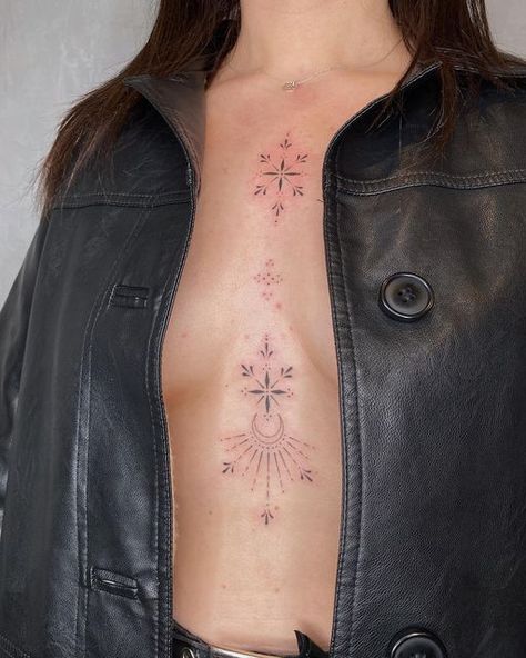 Emily ☾ Celestial Tattooist on Instagram: "Sternum and chest embellishments for the loveliest lady 💫✨ . . . . #finelinetattoo #fineline #sternumtattoo #ornamental #ornamentaltattoo #moontattoo #celestialtattoo #leeds #hydeparkleeds #tattooleeds #leedstattoo #delicatetattoo #femininetattoo #smalltattoo #tinytattoo" Sternum Ornamental Tattoo Women, Celestial Stomach Tattoos, Sparkle Tattoo Sternum, Sternum Sparkle Tattoo, Chest Sparkle Tattoo, Decorative Chest Tattoo, Chest Sternum Tattoo Female, Celestial Ornamental Tattoo, Sparkle Tattoo Chest