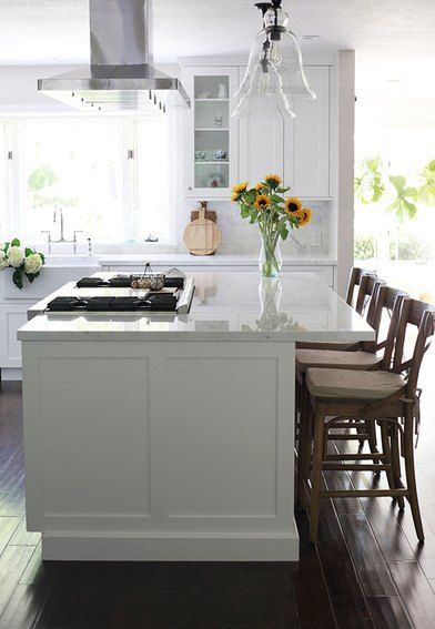 Kitchen Island With a Stove: Ideas and Inspiration | Hunker Kitchen Island With Cooktop, Island With Stove, Kitchen Island With Stove, Island Cooktop, Kitchen Peninsula, White Marble Kitchen, Kitchen Open, Kabinet Dapur, Diy Kitchen Renovation