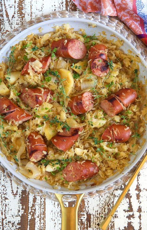 Kielbasa and Sauerkraut with Apples and Caramelized Onions - The Suburban Soapbox Sauerkraut With Apples, Kielbasa And Sauerkraut, Kielbasa Recipes, Kielbasa Sausage, Sauerkraut Recipes, Apple Sausage, Sausage Casserole, Pork Dinner, Kielbasa