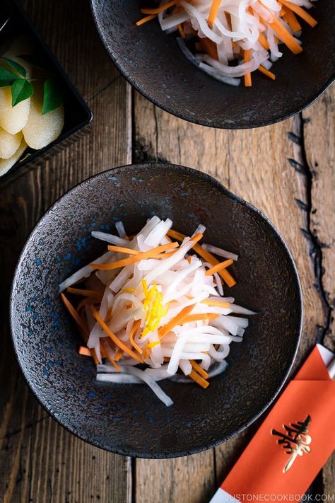 Julienned daikon and carrot pickled in a sweet vinegar sauce, Namasu is a refreshing salad commonly served as a Japanese New Year’s dish. It has a bright and zesty flavor that you'll love! #japanesenewyear #osechi #japanesefood #salad #sidedish | Easy Japanese Recipes at JustOneCookbook.com Japanese New Year Food, Sweet Pickles Recipe, Daikon Recipe, Pickled Carrot, Vinegar Sauce, Easy Japanese Recipes, Japanese New Year, Pickled Carrots, Radish Salad