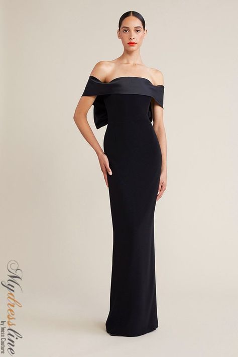 Looking for a show-stopping gown that is sure to turn heads? Look no further than the Audrey+Brooks 6205 Off-the-shoulder Gown. This gorgeous dress features a satin organza contrast wide collar with back bow and train, mermaid silhouette, hidden back zipper, and satin lined. Made from 80% TRIACETATE and 20% POLYESTER, this dress is sure to be a hit at your next event! Long Black Gowns Elegant, Off Shoulders Long Dress, Black Tie Gown Wedding, Floor-length Evening Dress For Wedding With Flattering Silhouette, Flattering Silhouette Floor-length Evening Dress For Wedding, Evening Dress With Fitted Bodice For Gala, Formal Evening Dress With Sweep Train For Gala, Elegant Dresses With Detachable Train For Gala, Fitted Elegant Evening Dress For Gala