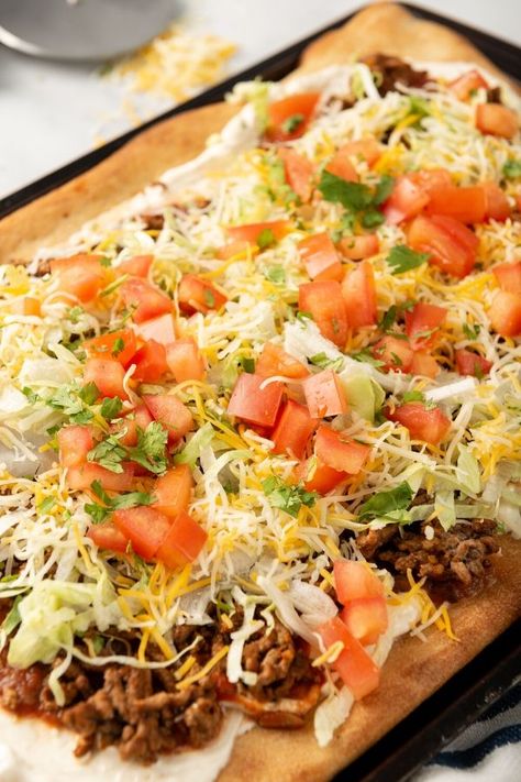 Taco Pizza Recipe - MenuPlans.com Making Menu Planning Easy! Taco Flatbread Pizza, Best Taco Pizza Recipe, Taco Pizza With Pizza Crust, Taco Pizza Recipe, Sheet Pan Taco Pizza, Sheet Pan Taco Pizza With Puff Pastry, Pizza On Soft Taco Shell, Homemade Taco Bell Mexican Pizza, Easy Taco Pizza