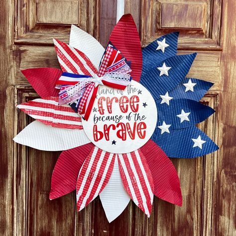 Celebrate with a DIY patriotic wreath made from Dollar Tree aluminum sheet pans. Easy instructions for a festive 4th of July decoration that will impress. Get your Americana fix now! Dollar Tree Patriotic Wreath, Diy Patriotic Wreath, July Decoration, Sheet Pans, Aluminum Pans, Festive Wreath, Let Freedom Ring, Aluminum Sheet, 4th Of July Decorations