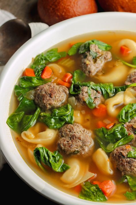 Tortellini Meatball Soup is just amazing. Filled with spinach and homemade meatballs to make it hearty as well as delicious. Tortellini Meatball Soup, Tortellini Meatball, Meatball Tortellini, Meatball Tortellini Soup, Homemade Tortellini, Cheesy Broccoli Soup, Spinach Tortellini Soup, Meatball Soup Recipes, Spinach Tortellini