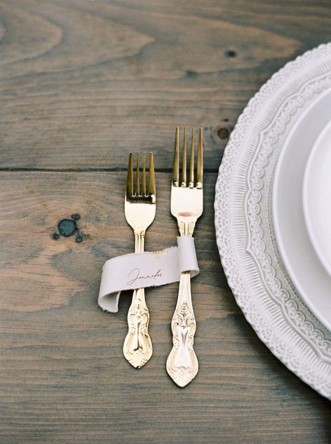 This Bridgerton inspired place setting gives off all the pride and prejudice wedding theme vibes with the intricate white china and delicate gold cutlery. This vintage style place setting is complete with a custom calligary scroll as a place setting. All rentals provided by @modernrugsentalsyyc Photo by @miltonphototo Autumn Place Cards, Bridgerton Inspired Wedding, Place Card Ideas, Beautiful Napkin Folding, Wedding Aesthetics, Bride Planning, Gender Party, Custom Wedding Stationery, European Wedding