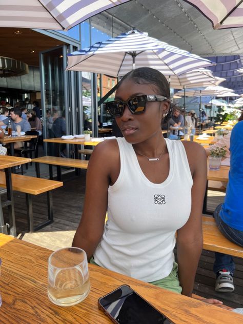 Loewe tank top, Fashion inspo, Dark skin #fashion #loewe Loewe Top Outfit, Loewe Tank Top Outfit, Loewe Black Tank Top Outfit, Dark Skin Fashion, Loewe Tank Top, Loewe Cropped Anagram Tank Top, Tank Aesthetic, Loewe Shirt Women, Loewe Top