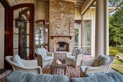 This gorgeous covered porch in Palmetto Bluff, SC features a fireplace and is ideal for year-round indoor/outdoor living and entertaining. | usserygroup.com Palmetto Bluff Homes, Building A Custom Home, Best Questions To Ask, Southern Coastal, Best Questions, Indoor Outdoor Fireplaces, Charleston Style, Addition Ideas, Palmetto Bluff