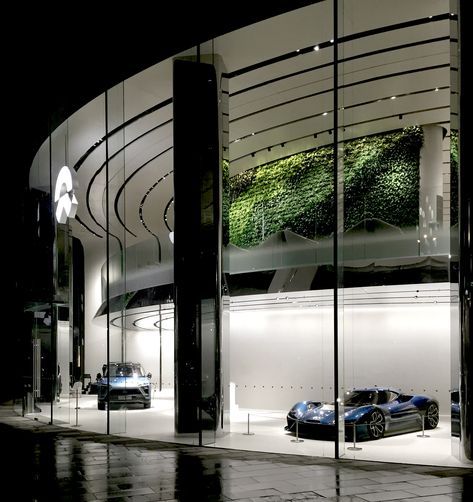 NIO HOUSE is a showroom gallery and members' clubhouse for the Electric Car Brand NIO. The Chinese name for NIO is "WeiLai", which translates to "the future." Our challenge was not to design a space that looked "futuristic" but rather to design a space capable of adapting to the future demands of the brand. For example, the vision of NIO required the space to accommodate the quickly evolving product line and flexibility to hold multiple events at one time with ease. Car Showroom Architecture, Automotive Showroom, Car Showroom Interior, Car Showroom Design, Luxury Garage, Design A Space, Architecture Inspiration, Chinese Name, Lexus Cars