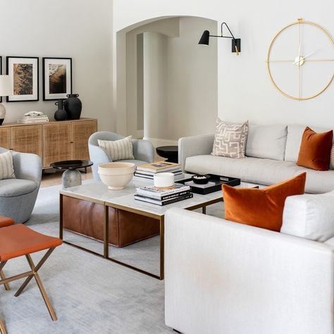 Our clients requested a family room that was perfect for entertaining, so we knew we needed to nail three things: ⠀⠀⠀⠀⠀⠀⠀⠀⠀ 1. A neutral colour palette to add brightness with pops of darker tones for contrast 2. PLENTY of seating 3. The perfect furniture placement ⠀⠀⠀⠀⠀⠀⠀⠀⠀ With a pair of sofas, accent chairs, ottomans, and an additional chair in the corner (not shown) in neutral tones with throw pillows and accent decor in darker tones, we think we nailed #1 and #2. ⠀⠀⠀⠀⠀⠀⠀⠀⠀ To get #3 just ... Toronto Interior Design, Furniture Placement, Cozy Lounge, At Your Own Pace, Your Own Pace, Family Room Design, Furniture Arrangement, Move Forward, Neutral Colour Palette