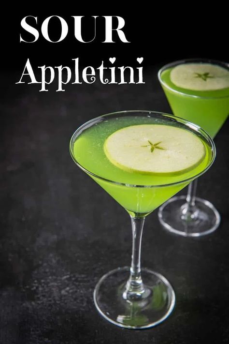 Be prepared to pucker up with this appletini cocktail. This recipe has a sour edge to it but is so delicious that you'll smack your lips after every sip. It has a gorgeous green color and perfect to serve at your St. Patrick's day celebration. #appletini #stpatricksday #cocktail #dishesdelish Drinks With Sour Apple Pucker, Drinks With Apple Pucker, Sour Apple Cocktail Recipes, Green Colored Cocktails, Apple Pucker Cocktails, Appletini Recipe Martinis, Pucker Drinks Recipes, Sour Apple Pucker Drinks, Shrek Cocktails