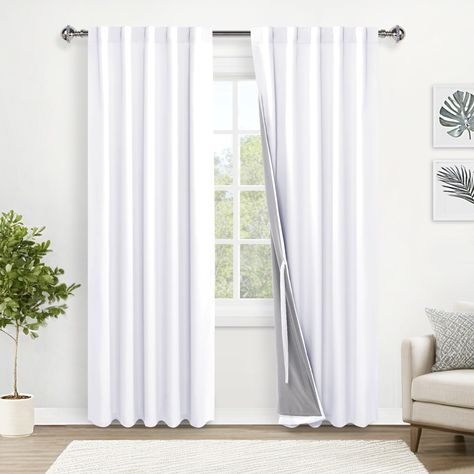 PRICES MAY VARY. PACKAGE INCLUDES: 2 total blackout curtain panels per package (No Curtain Rod). Each curtain measures 38" wide by 84" long inches (Total width is 76 inches), with 2 top hanging options (6 hooks Back tab & 3-inch Rod pocket) for your personalized style and fit most rods. 100% BLACKOUT EFFECT: Made of 2 layer high quality fabric, our blackout curtains can block out all light and UV rays. The surface layer can meet your need for different kinds of decoration style and the inner lay